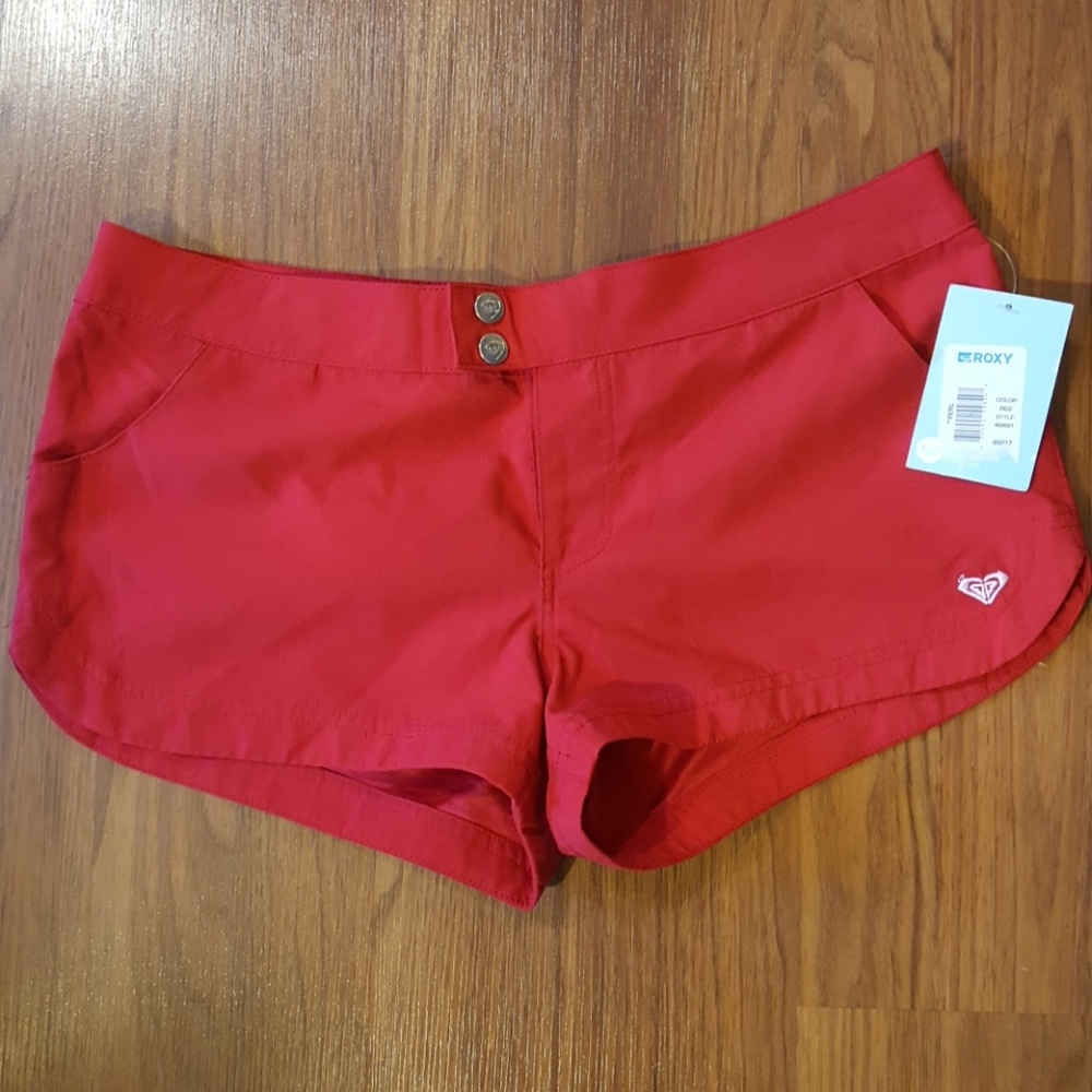 Brand New Red  Roxy Board shorts. Size 7.